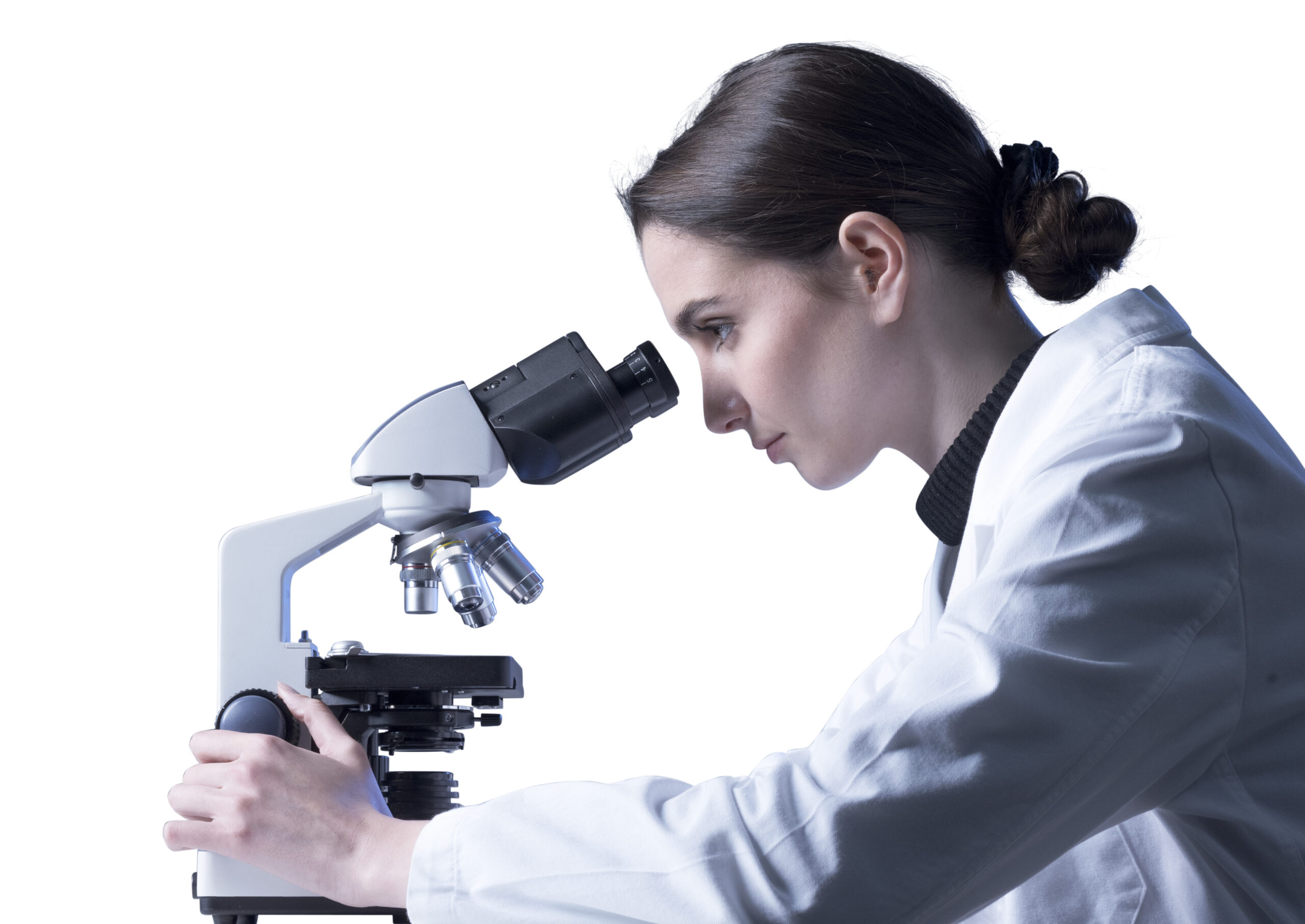 Scientist looking through a microscope in a laboratory
